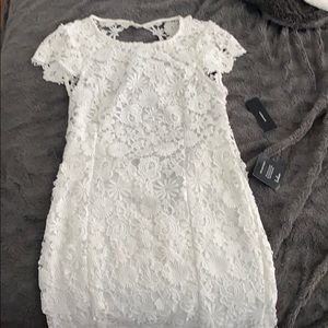 romance language backless white lace dress